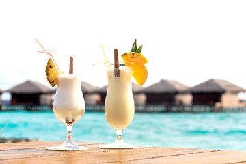 Two cocktails on tropical beach vacation