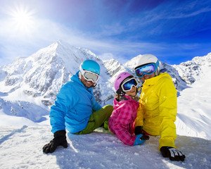 Fototapeta na wymiar Ski, skier, family enjoying ski vacation