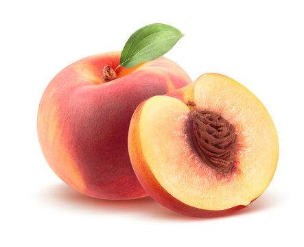 Beautiful whole peach and split isolated on white