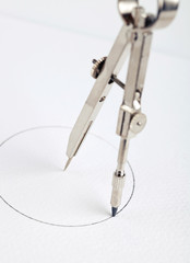 pair of compasses drawing circle