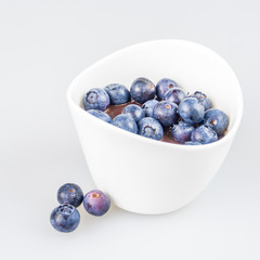 one cup of pudding with blueberries