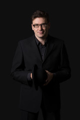 Naklejka premium Man hold bowler hat.