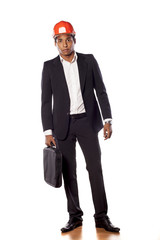 African businessman with a helmet and briefcase