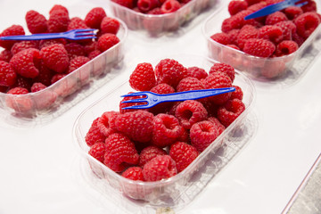 colored red raspberries