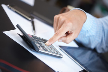 businessman with calculator