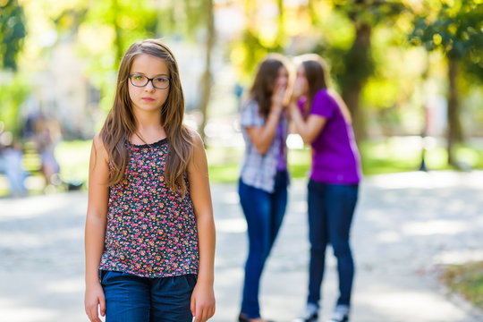 Envious girls discriminating her girlfriend