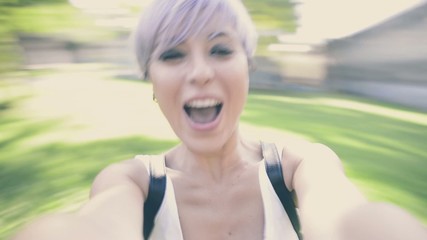 couple hipster having fun moving around hand to hand