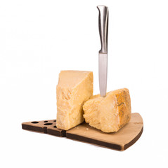 Parmigiano reggiano chees with knife isolated on white