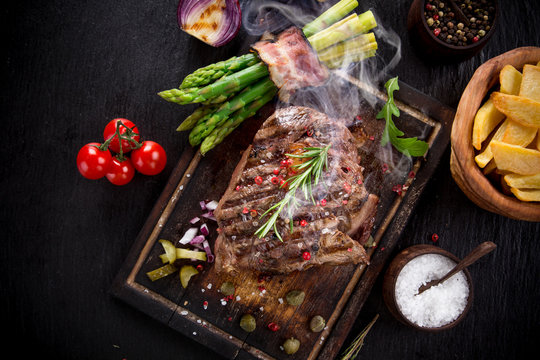 Delicious beef steak on stone table, close-up