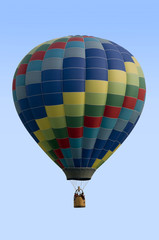 Naklejka premium Hot Air Balloon Against Blue Sky
