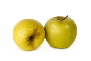 Naklejka na ściany i meble Yellow apples on white background