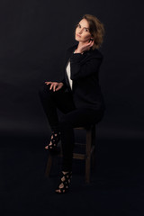 stylish beautiful girl in a suit