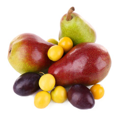 Beautiful ripe pears and plums isolated on white