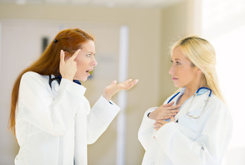 health care professionals doctors fighting having argument 