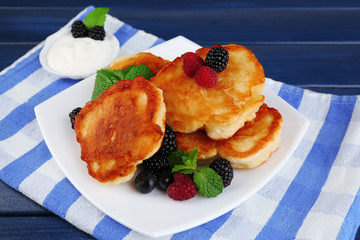 Tasty pancake with fresh berries and mint leaf