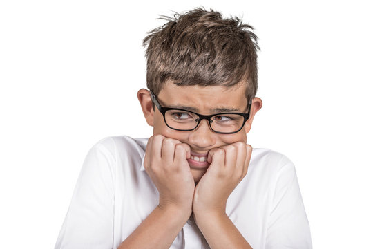 Headshot anxious stressed boy with glasses on white background 