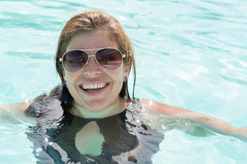 Middle age woman in a swimming pool