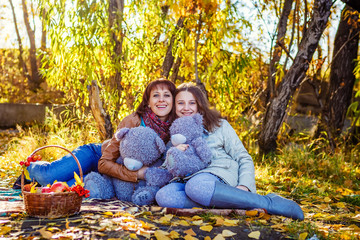 Family in the fall in park