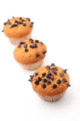 chocolate chips Muffins on a white background