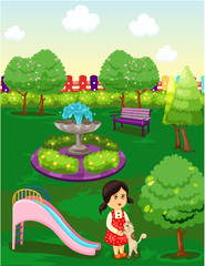 cute little girl playing with cat in the park