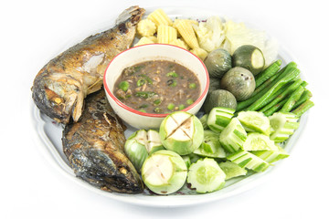 Shrimp paste with fried mackerel and vegetable isolate on white