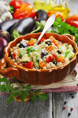 Pilaf made ​​of wheat grains and vegetables