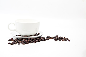Brown coffee beans and coffee cup isolated on white background