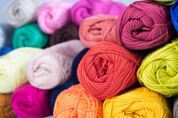 colors of yarn thread on white background 