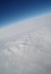 clouds and blue sky seen from plane