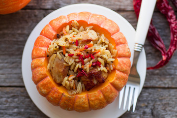 spicy rice with chicken in pumpkin
