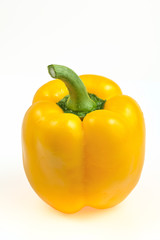 sweet yellow bell pepper on a white background illuminated