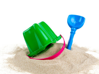 Fototapeta na wymiar beach sand, shovel and bucket