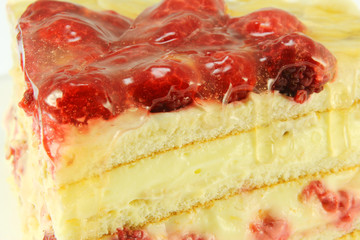 Raspberry Cake for holidays with strawberries and vanilla cream.