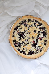 Black currant and almond pie, selective focus