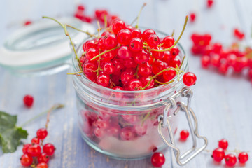 red currant fruit jar wooden table
