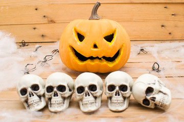Halloween pumpkin and skulls