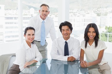 Fototapeta premium Smiling business team in an office