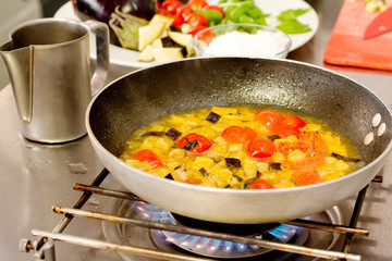 saute vegetables cooking inside pan