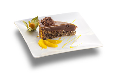 chocolate cake with nuts and orange slices