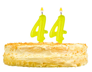 birthday cake with candles number forty four isolated on white