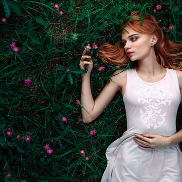 Fabulous Portrait Woman Lying Down In Field With Flowers