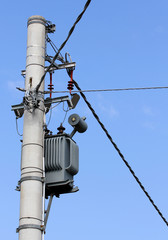 Obraz premium electricity transformer with cables on a pylon