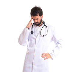 Fototapeta premium Frustrated doctor over isolated white background