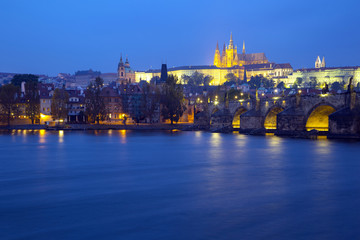 View of Charles Bridge and Castle in Prague at night