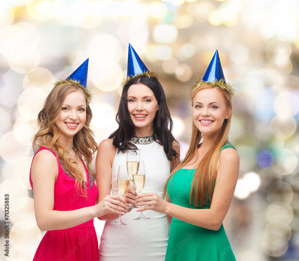 Poster smiling women holding glasses of sparkling wine