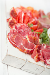 antipasti Platter of Cured Meat,   jamon, sausage, salame on whi