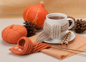 Autumn Concept. Cup Of Hot Tea With Sweets. Yarn Knitting. Pumpk