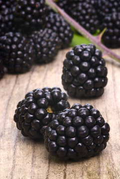 blackberries on wooden table