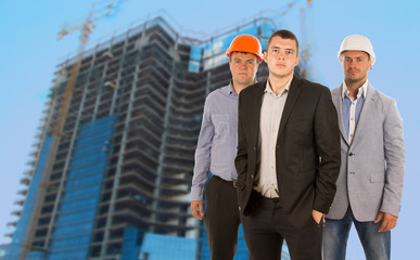 Fototapeta premium Group of three engineers and architects