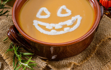 Pumpkin soup for Halloween party, close-up